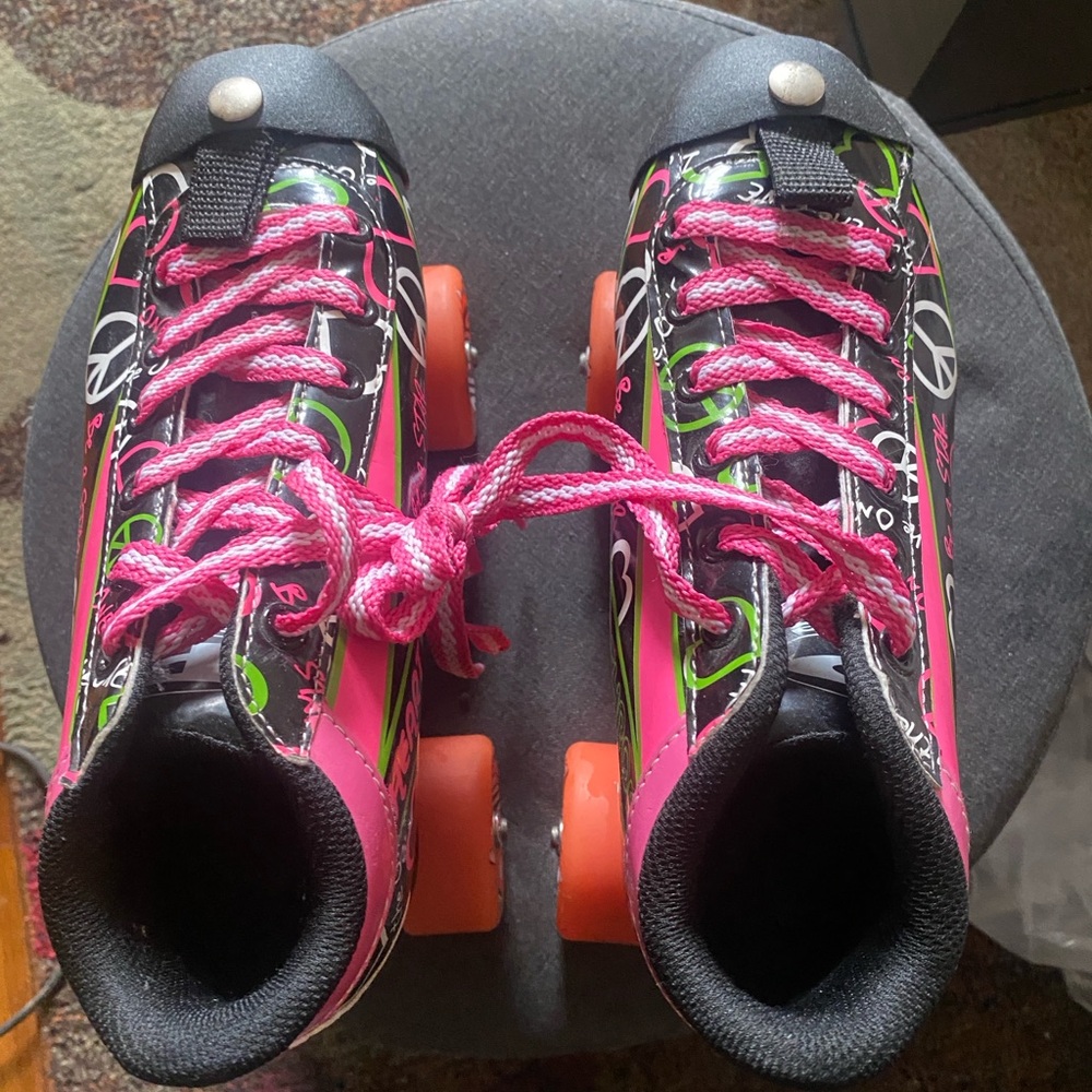 Heart throb Pink and Black Roller Skates with Orange Wheels